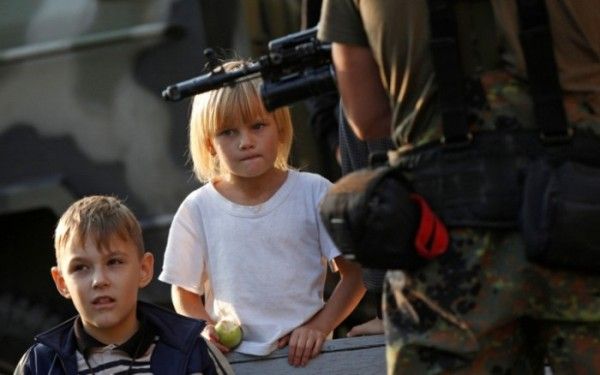 У Мінську домовилися припинити стріляти на Донбасі з 1 вересня